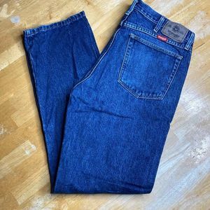 Vintage Wrangler Jeans with red tab label above pocket, excellent condition